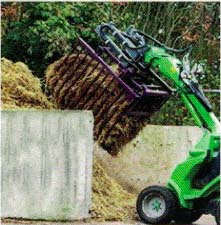 Purple Packer Taking Hay Outside