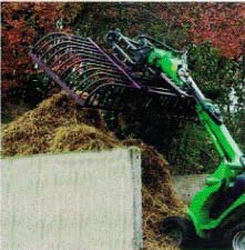 Purple Packer Releasing The Hay